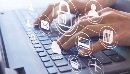 Person typing on a keyboard